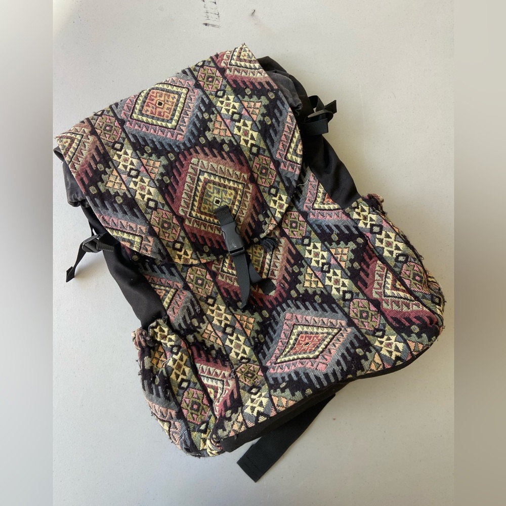 Tapestry fabric custom backpack. Well loved still very functional. Large/sturdy